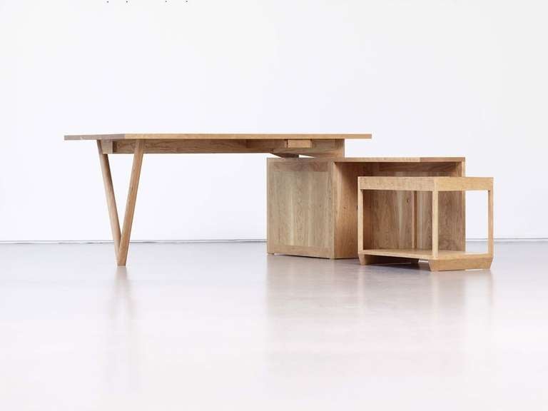 Desk made of cherrywood by Bahk Jong Sun. Trans L-C 2011-01.

A master of minimalistic furniture design, Bahk Jong Sun, incorporates the subtleties of the natural elements, along with various species of wood, to create a fusion of organic and