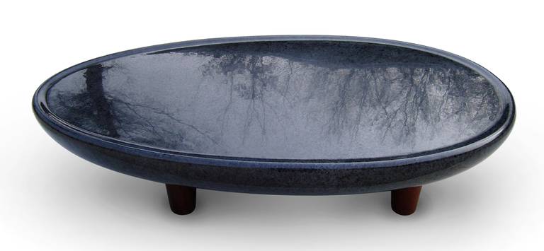 Afterimage 09-314, Indoor/outdoor Table, Black granite, Ipe.

Founded in the 1980's in Korea Gallery Seomi is based out of Pierre Koenig’s iconic Case Study House #21 in the Hollywood Hills of Los Angeles. Gallery Seomi goes beyond the realms of