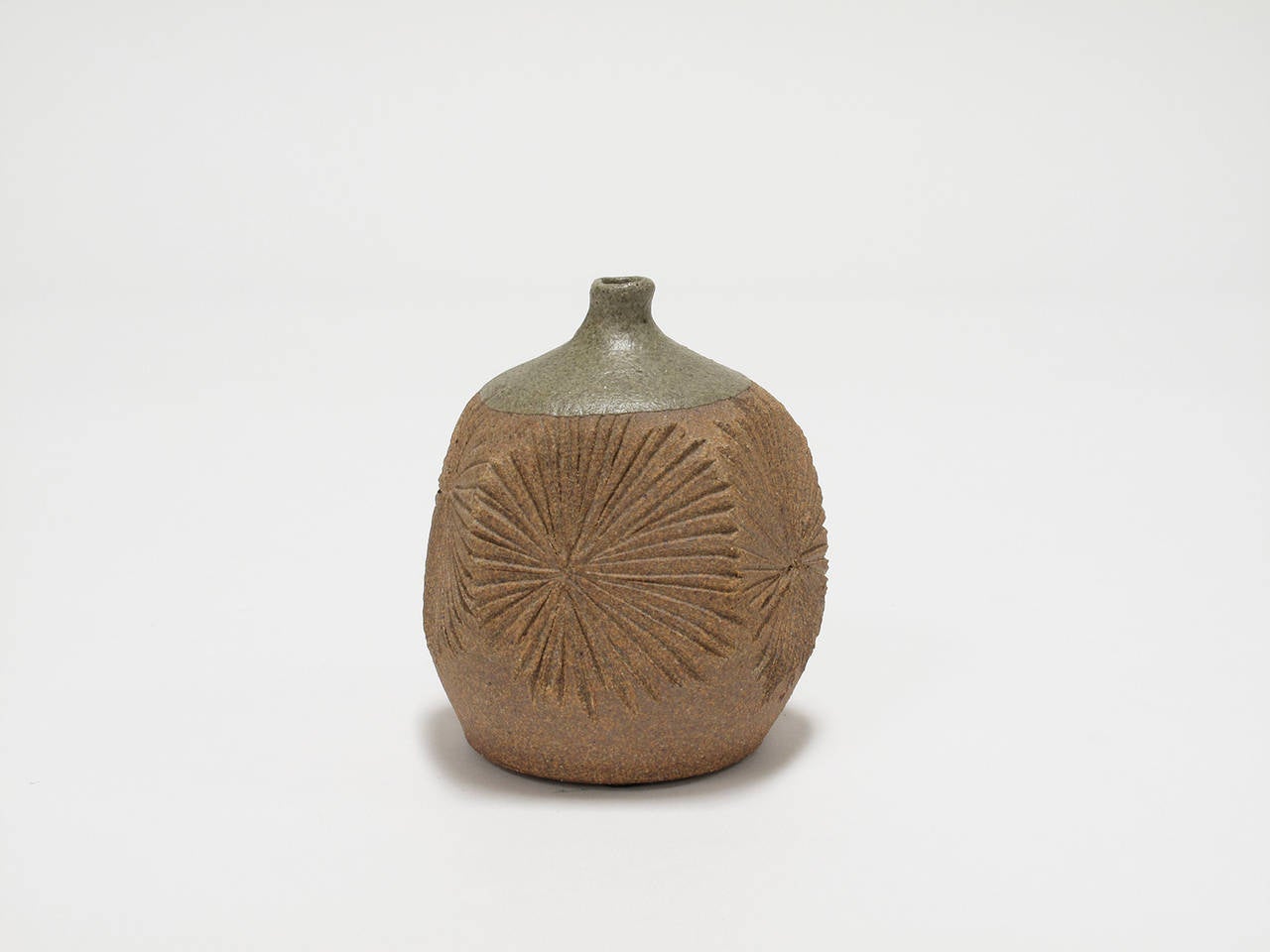 Unique and rare, bud vase featuring the 