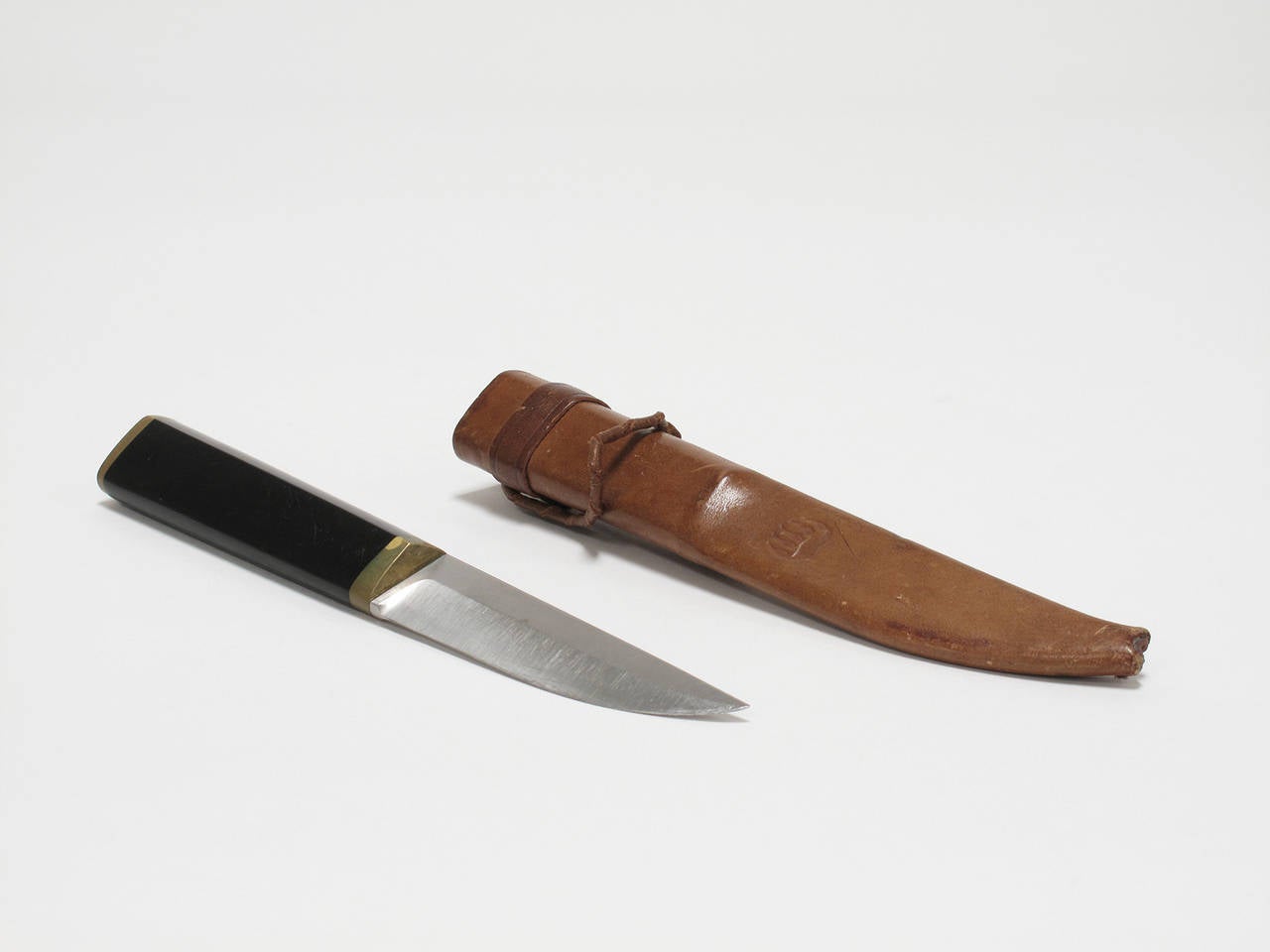 Tapio Wirkkala did much of his initial design work using a traditional Finnish carving knife, the puukko, carving molds for his work by hand. Wirkkala designed his own version of the knife in 1961. The Tapio Wirkkala Puukko was built by Hackman
