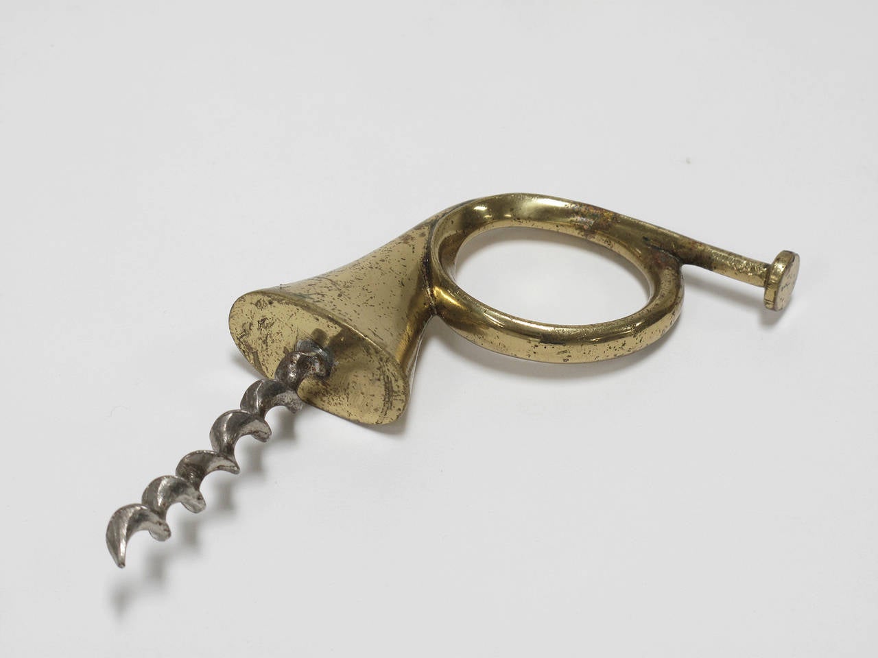 Carl Auböck
objet d'art barware tool corkscrew formed in the shape of a horn.
Austria Modern, 1950s.
Werkstätte Auböck.
Brass, solid cast,
unsigned.