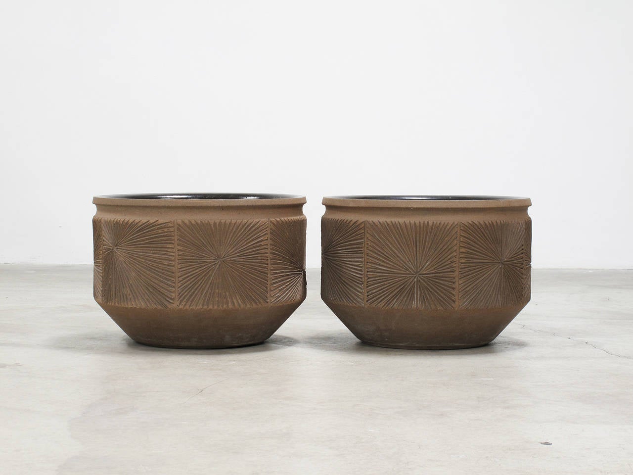 David Cressey & Robert Maxwell
'Sunburst' design ceramic vessels
Stoneware, black glazed interior with unglazed exterior, handmade
Earthgender Ceramics
California, 1970s
12.75 high x 18.5 diameter inches