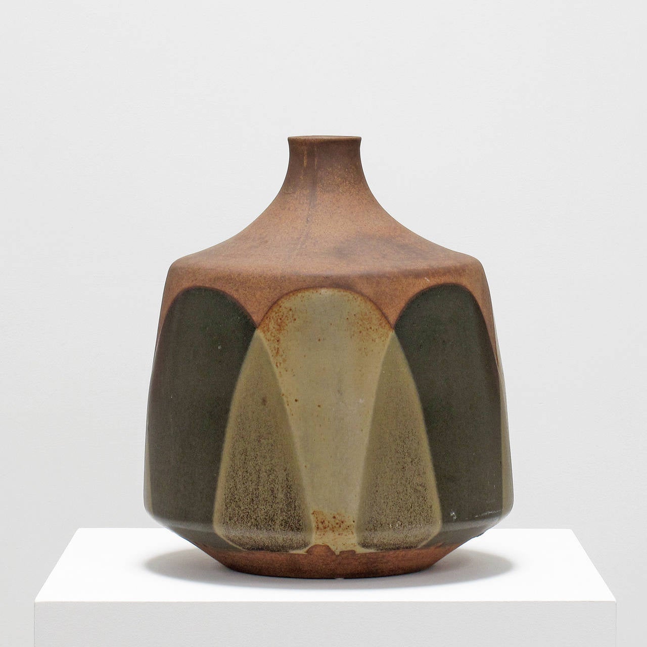 David Cressey
'Flame' glaze design ceramic lamp base, 1960s
Stoneware, glazed dark olive and golden ochre
Pro Artisan Collection
Architectural Pottery
Los Angeles, California

Measurements in inches: 16 high x 12 diameter

The original wood