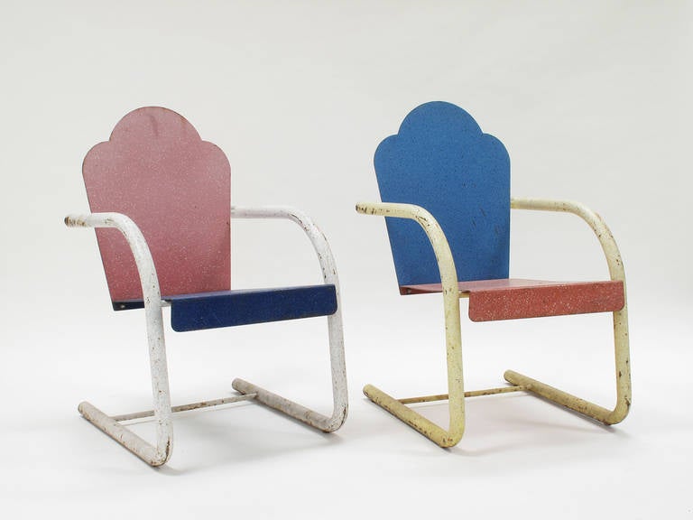 Peter Shire designed and personally made only a few dozen of these chairs in the 1980s for a Hollywood executive's patio. These exuberant post-modern versions of the classic lawn chair are highly coveted pieces and are a great addition to any