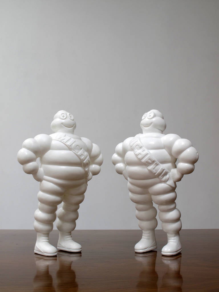 Twelve inch tall, white molded, hard plastic, vintage Michelin Man 