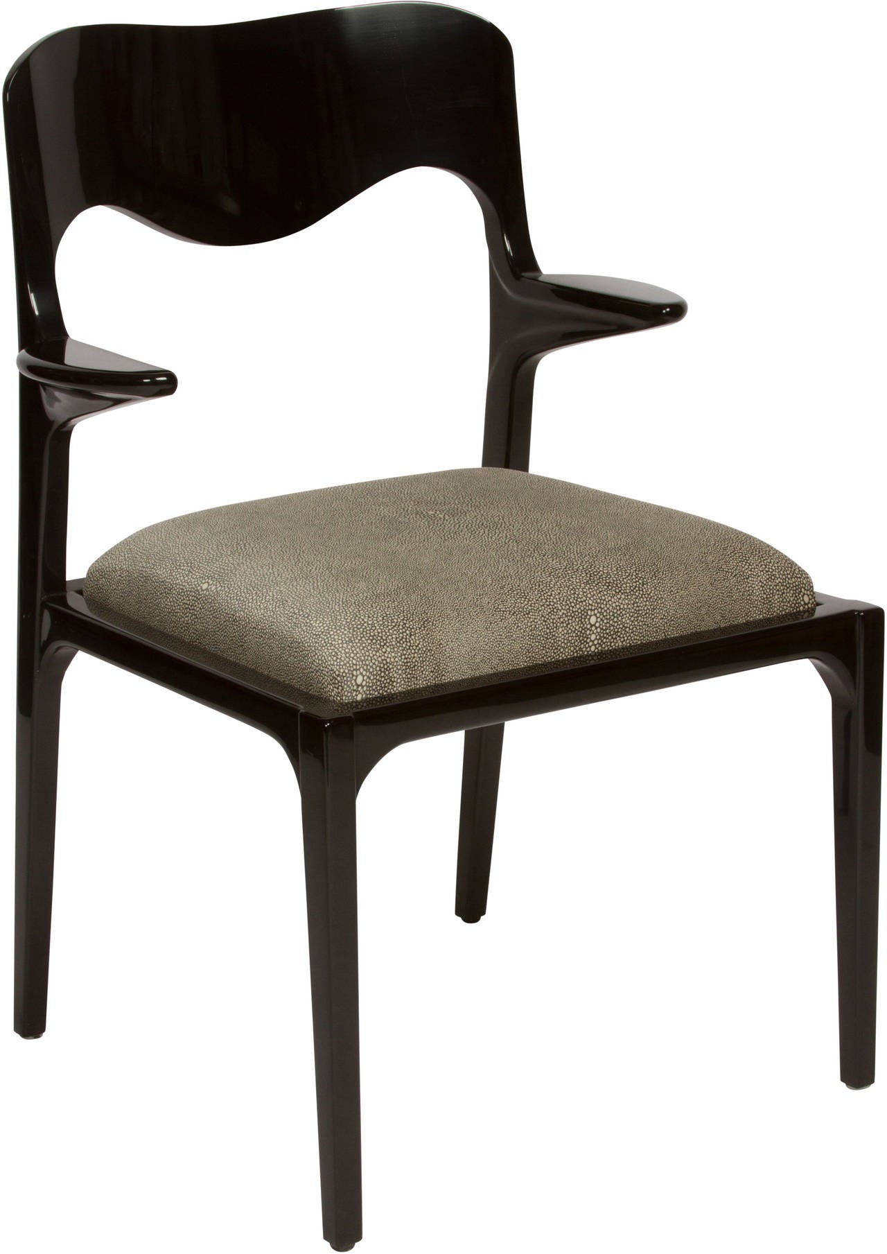 Set of eight black lacquered dining chairs reminiscent of the style of Samuel Marx. Newly re-upholstered in shagreen embossed fabric.