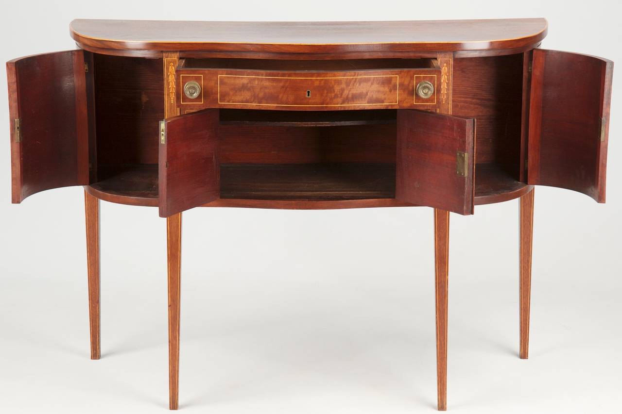 Of particular note in this attractive Centennial reproduction of an American Federal Sideboard is the delightful size - measuring just under 48