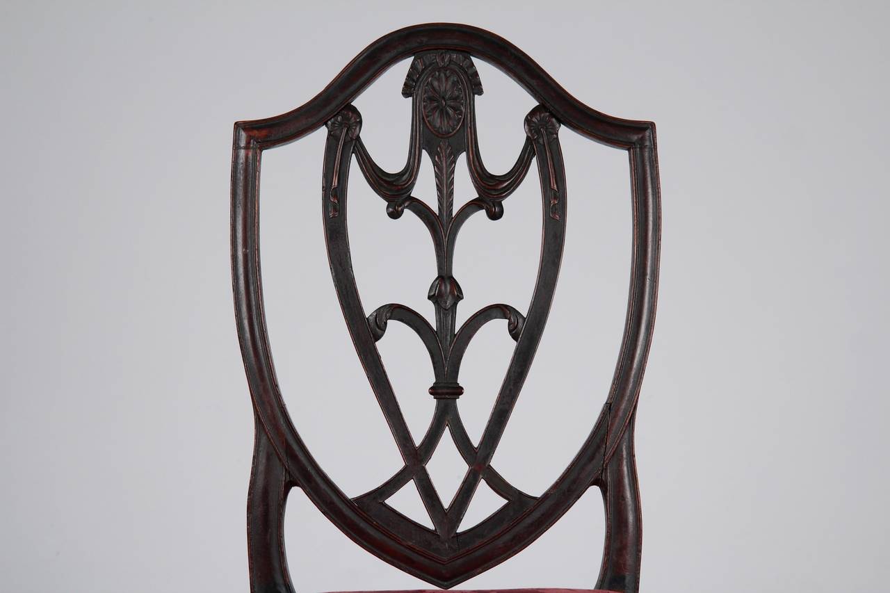 RARE AND EXCEEDINGLY FINE AMERICAN FEDERAL CARVED MAHOGANY SIDE CHAIR
New York c. 1790-1800 with original surface

Exhibiting the finest lines and perfect sense of proportion to be found in any form of the period, this rare and incredibly