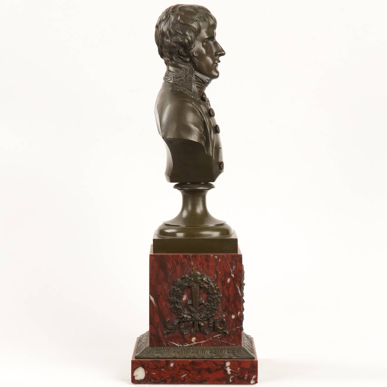 This is a very finely cast French School antique bronze sculpture depicting Napoleon as First Consul.  It is very finely detailed, the surface of the bronze filed and chased impeccably.  The moment captures Napoleon as a young man, depicted with a
