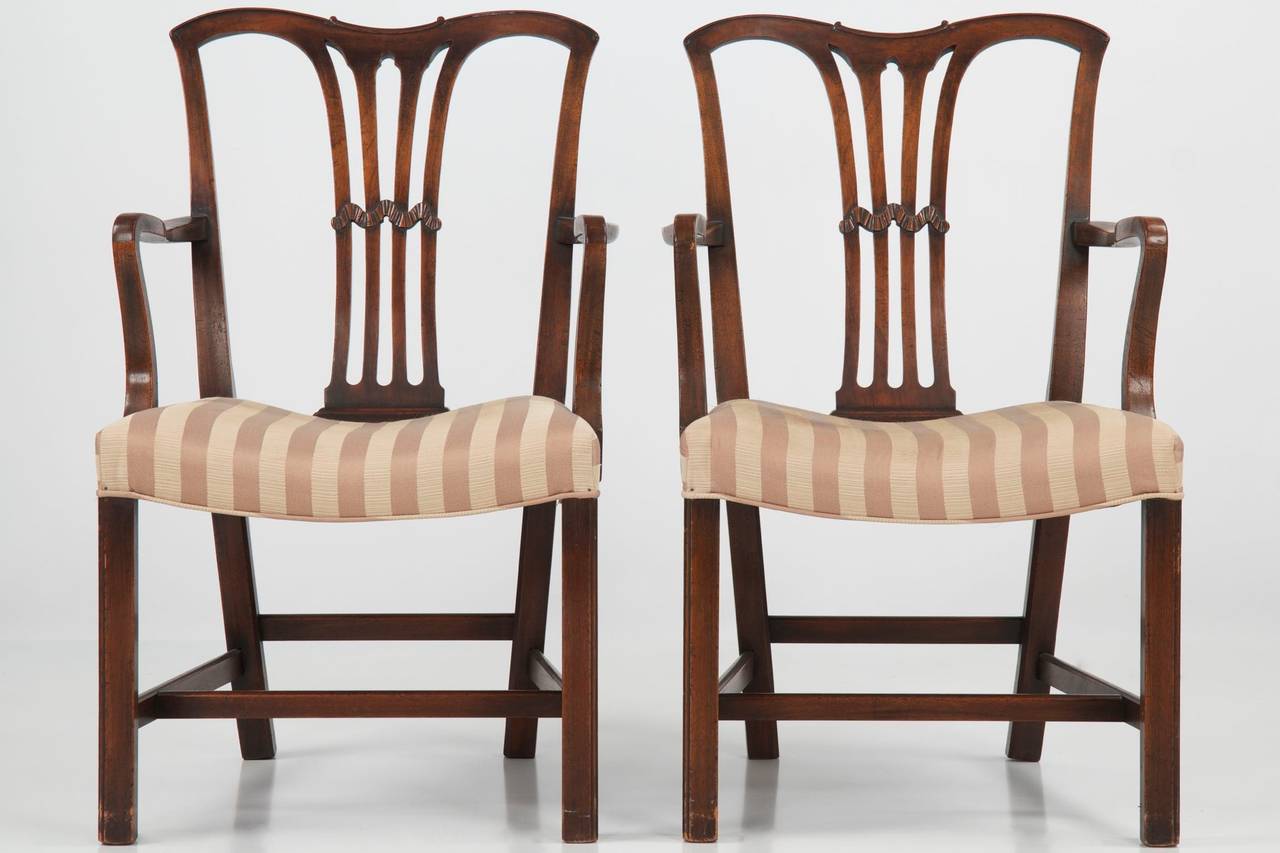 Of excellent quality, this set of six Chippendale Style mahogany dining chairs are clearly benchmade and entirely hand crafted, probably during the last years of the 19th Century.  With only subtle embellishments, the set is relatively austere