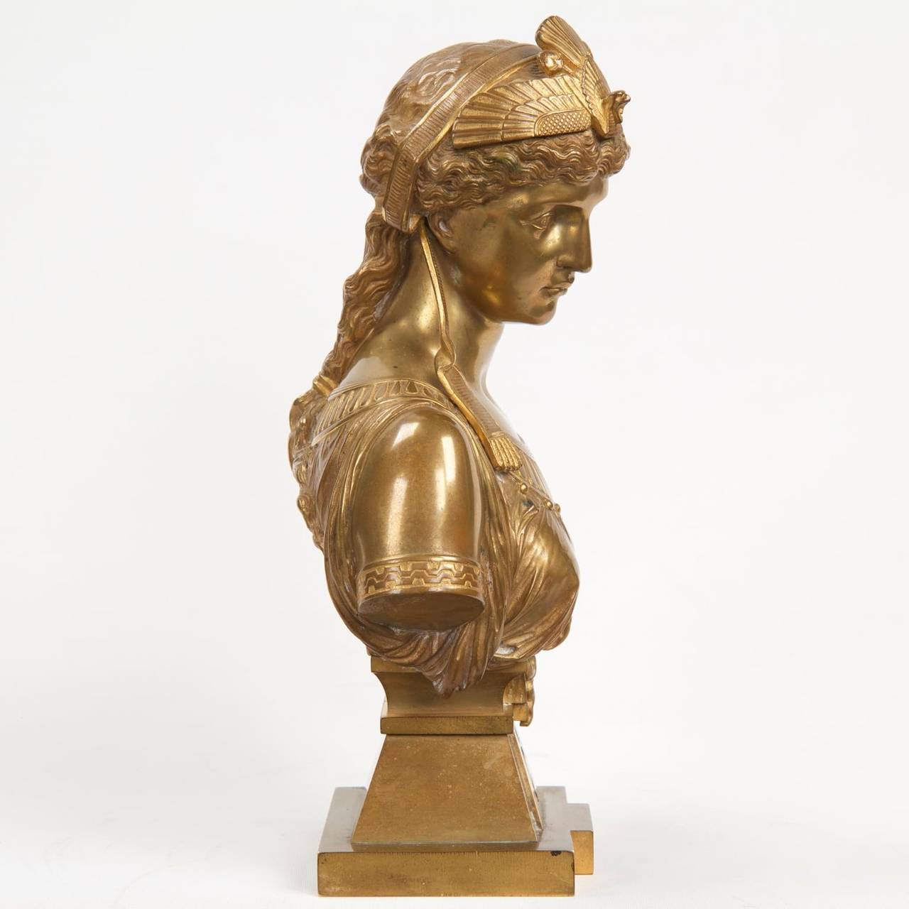 This precisely modeled and incredibly attractive work by Eutrope Bouret was likely cast during the last ten years of the 19th century, the quality and detail of the sculpture without question excellent. The bust depicts Cleopatra with a spread eagle