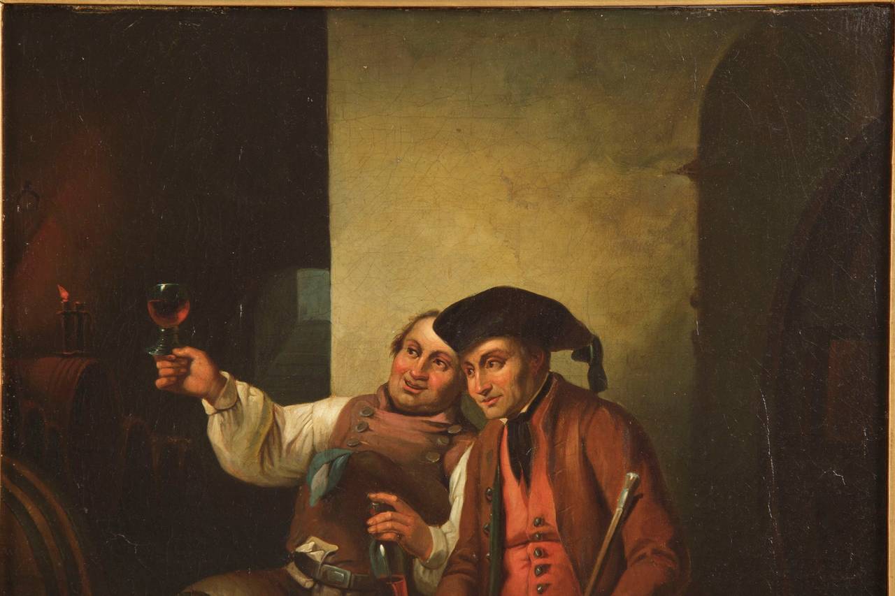 A very fine rendition of a dark space, this precious mid-19th Century painting captures an intricately detailed scene of a winemaker showing a red wine to his patron in the dim light of the wine cellar.  The background is suggested, with large wine