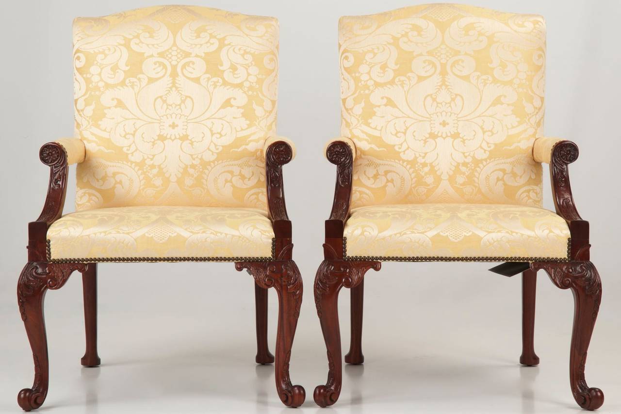 This pair of Chippendale Style chairs are crafted after the chair seen frequently in the paintings of Thomas Gainsborough and currently residing in the White House.  Offered in the Stately Homes Collection by Baker, these are currently for sale as a