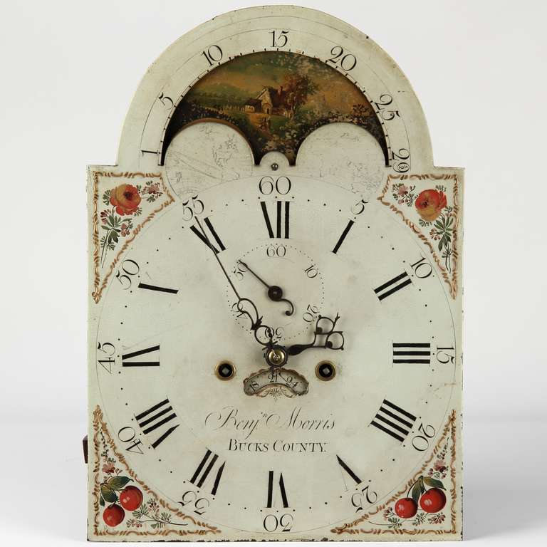The movement of this rather fine tall case clock is signed by Hilltown, Pennsylvania clockmaker Benjamin Morris. Working in Reading, Hilltown and New Britton, PA, Morris was a highly productive clock maker who is estimated to have made at least