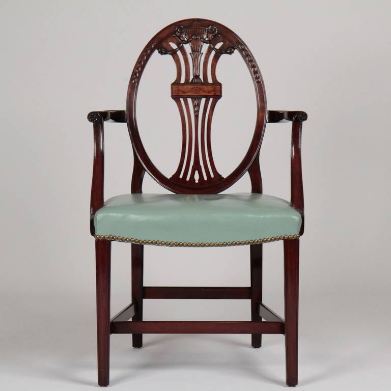 This is a very fine set of Ten English Hepplewhite Style Antique Dining Chairs originally retailed by the B. Altman & Co stores in New York City during the first quarter of the 20th Century. B. Altman & Co., a high-end department store known for
