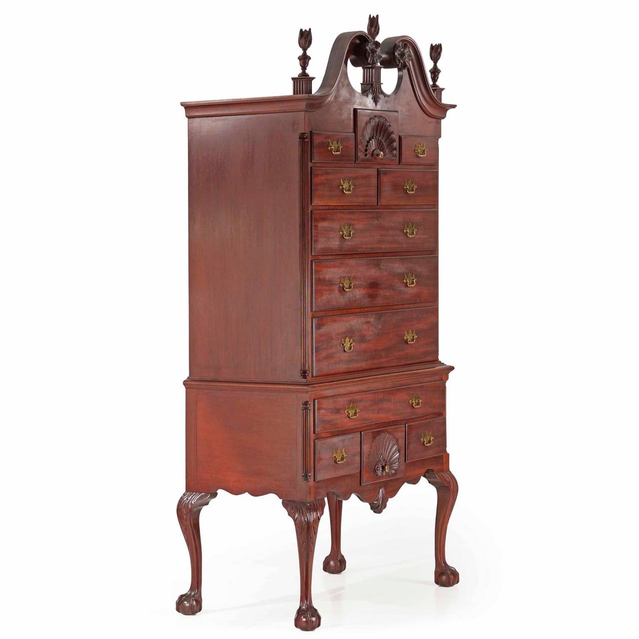 A finely hand crafted piece in the manner of the Philadelphia forms of the late 18th Century, this highboy was probably crafted shortly after the Centennial during the last years of the 19th century or possibly the first quarter of the 20th Century.