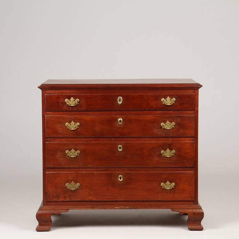 This is an excellent example from the Philadelphia or Delaware River Valley region of Pennsylvania, a fine American Chippendale Walnut Chest of Drawers of rather desirable proportions.  The chest has a refined presence with well preserved color in