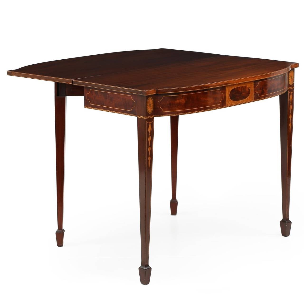 A crisp and vibrant card table reproduced in the American Federal style of Baltimore, this is a beautiful presentation piece that probably originates from the middle of the 20th Century.  The mahogany chosen for the two tops and the veneering around