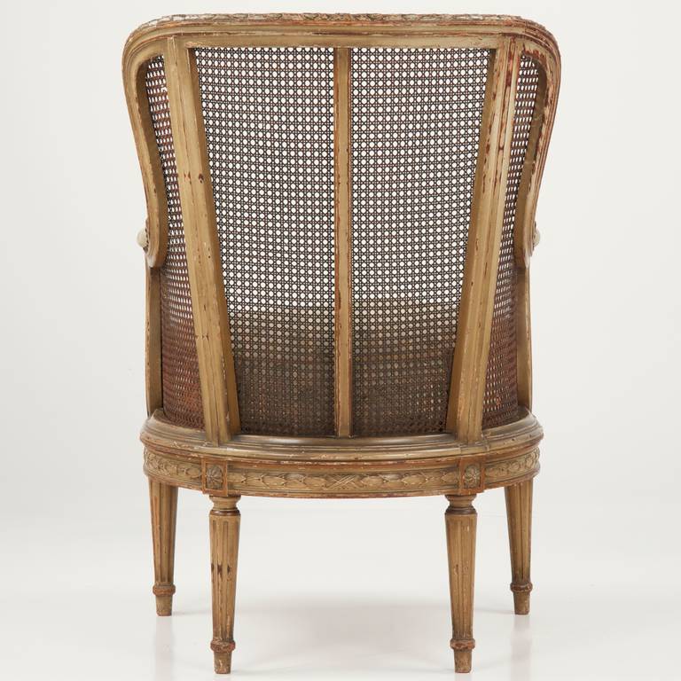 Finely Carved French Louis XVI Style Antique Bergere Arm Chair C Finely Carved French Louis XVI Style Antique Bergere Arm Chair c. 1890 In Distressed Condition - Finely Carved French Louis XVI Style Antique Bergere Arm Chair C