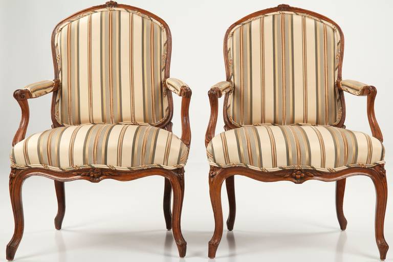 PAIR OF FRENCH LOUIS XV BEECHWOOD FAUTEUILS EN CABRIOLET
Stamped M . DELAPORTE on both rear chair rails
Item #  1407NPK15P 

A very fine pair of restored Louis XV period arm chairs, both stamped along the interior edge of the back rail in each