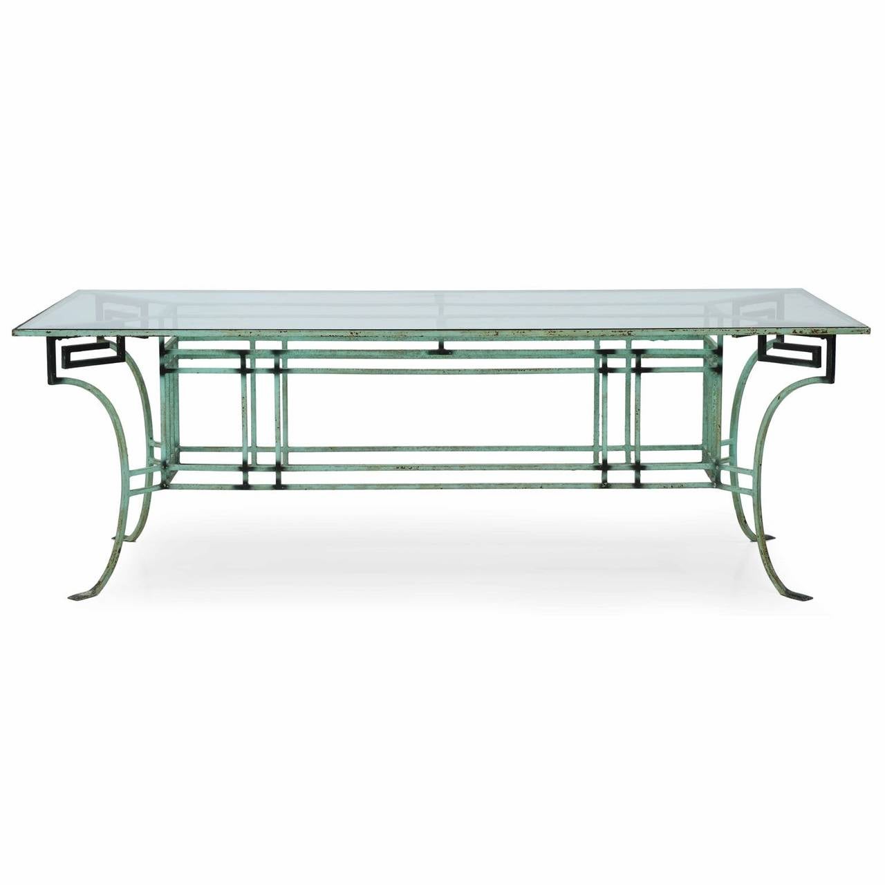 The extremely worn crackled teal paint has simply the most magnetic effect when viewing this table - the table has a certain elegance that juxtaposes the rustic nature of the surface, no doubt from the angular Neoclassical form.  The austere and