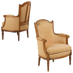 Pair of French Louis XVI Style Carved Beechwood Bergere Armchairs, 19th Century