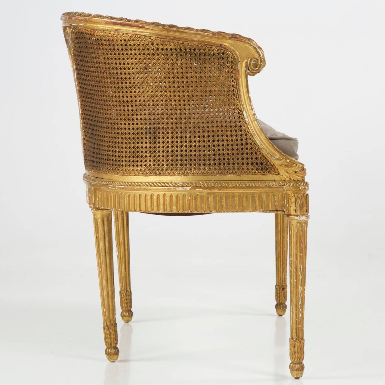 A delightful little French gilt wood settee of small proportions, generally referred to as a 