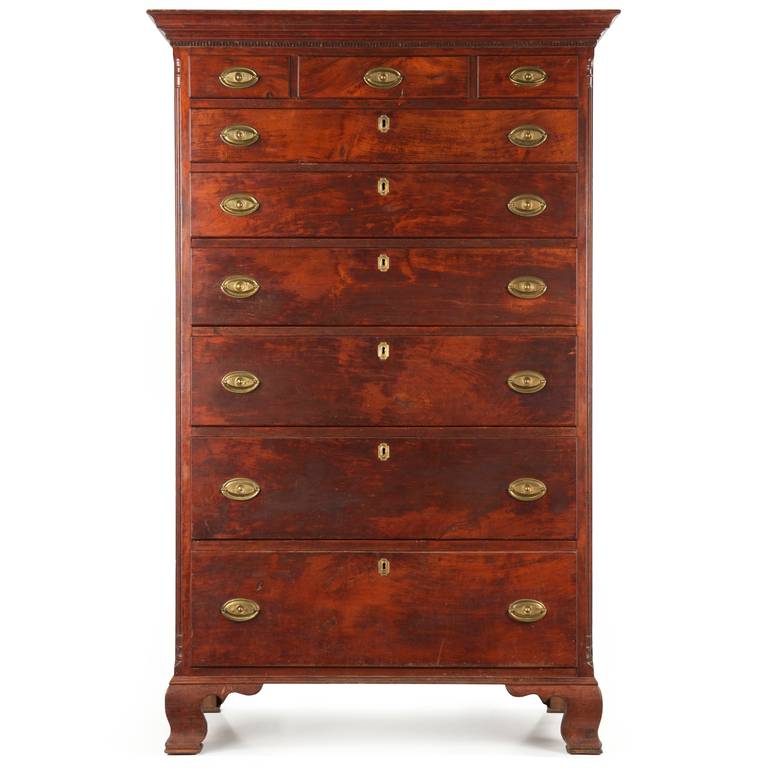 The entirety of this fine tall chest of drawers is preserved in nearly untouched condition.  All primary surfaces are crafted from cherry, this obscured beneath the highly oxidized and worn finish - the surface is very early, if not original with