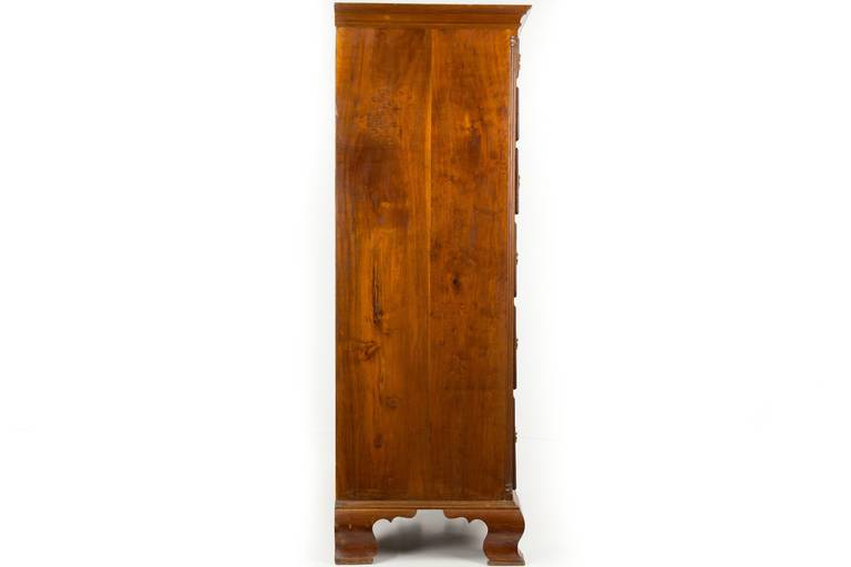 tall walnut chest of drawers