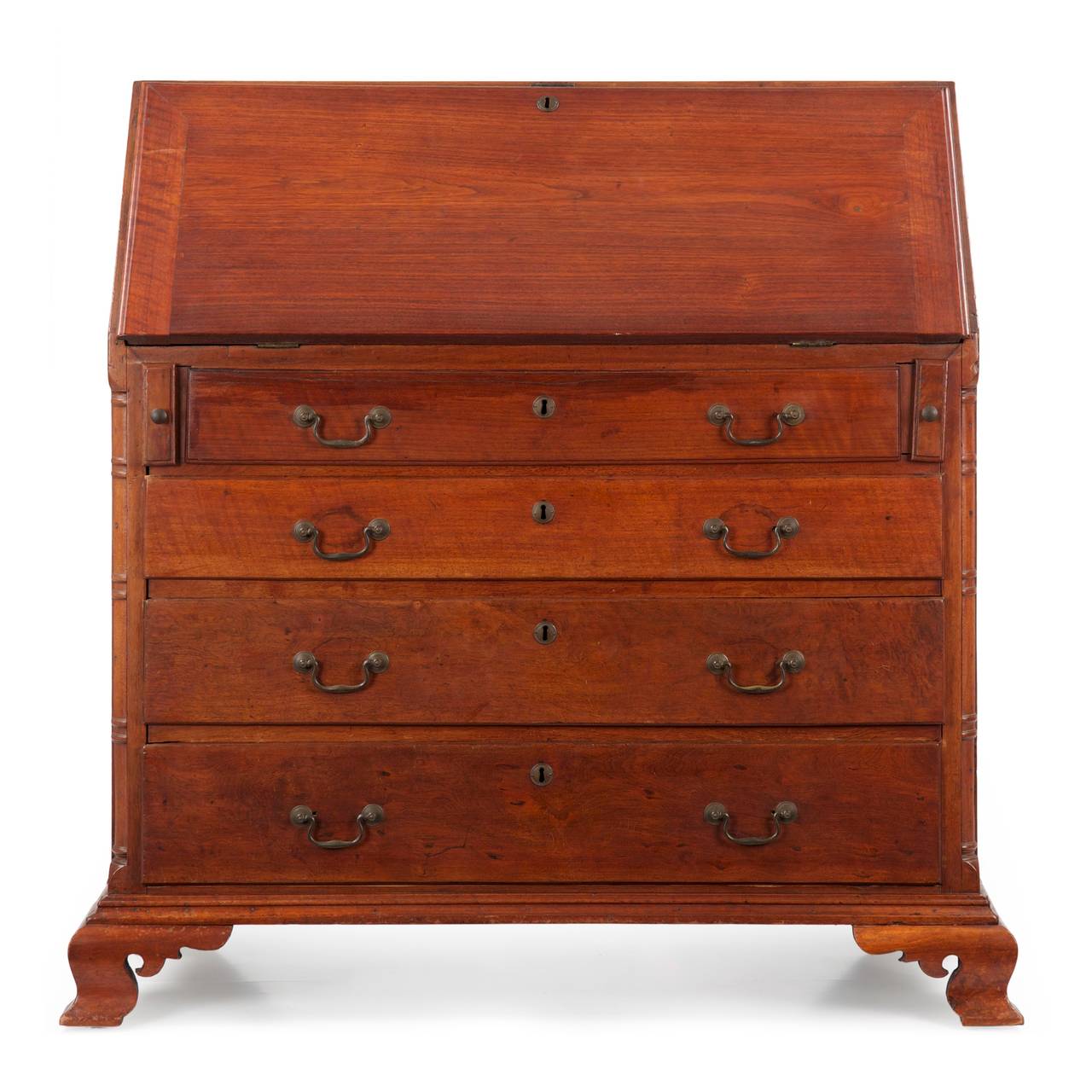 AMERICAN CHIPPENDALE WALNUT SLANT FRONT DESK, PENNSYLVANIA
Probably Chester County, signed illegibly four times and dated 1807

This fine example of Eastern Pennsylvania craftsmanship, almost certainly originating in Chester County, has a