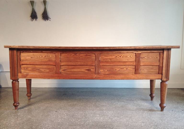 French oak eight drawer tailor's counter. France, late 19th century.