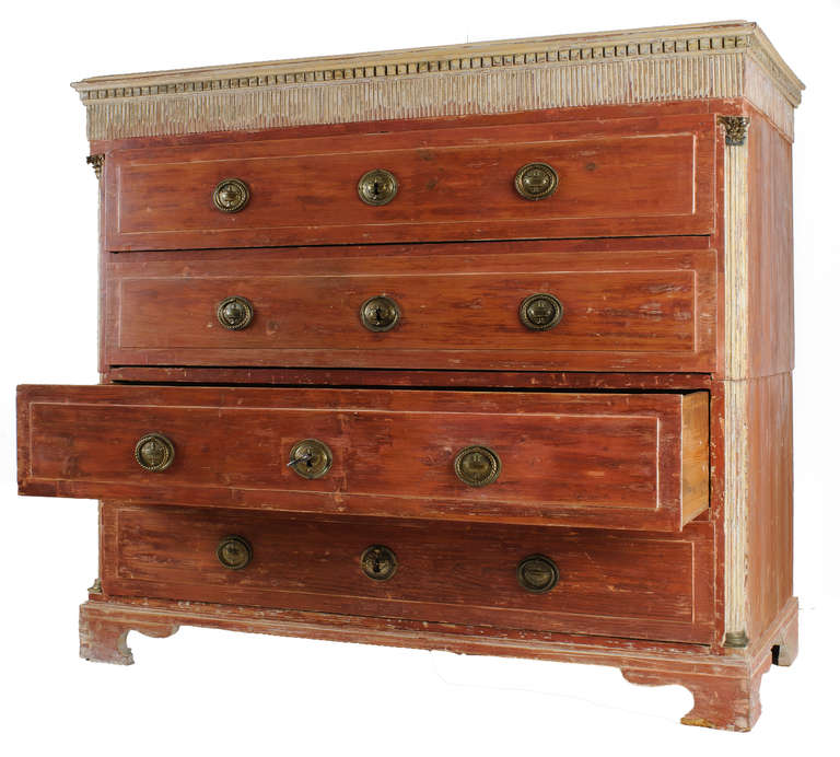 This two part, four drawer Gustavian commode with double edge molding, a dental and strie band detail around the top is both simple and refined. There are Corinthian columns on front corners with bronze mounts at top and base of columns. The drawers