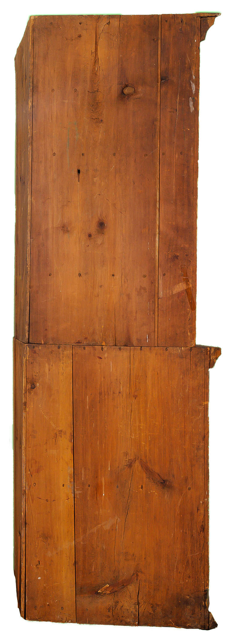This two-piece corner cupboard has a barrel front. The 