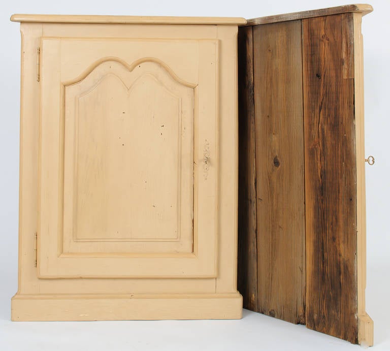 This pair of corner cabinets can be hung or set on the floor. The double raised panel is rusticated and charming. Each cabinet has one interior shelf.