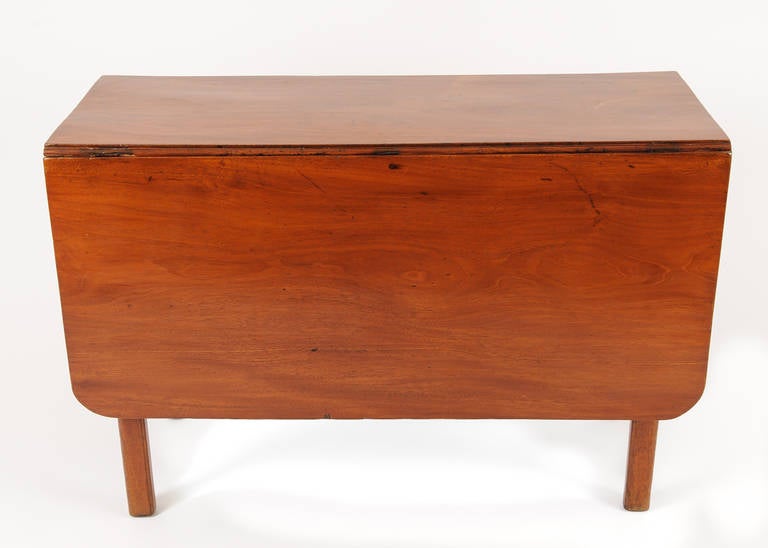 A fine American mahogany Chippendale drop-leaf table with two deep leaves, each measuring 18