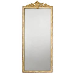 Antique Louis XVI Style Mirror with Gilded Frame and Applique Top