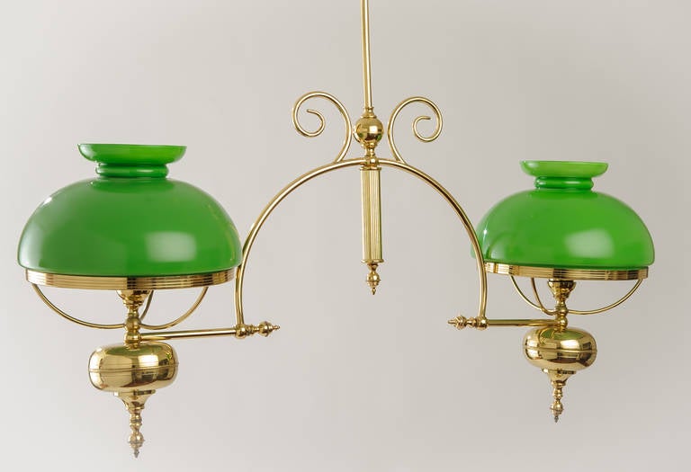 19th century French solid brass lamp with the original emerald green glass shades has been wired for use in the US.