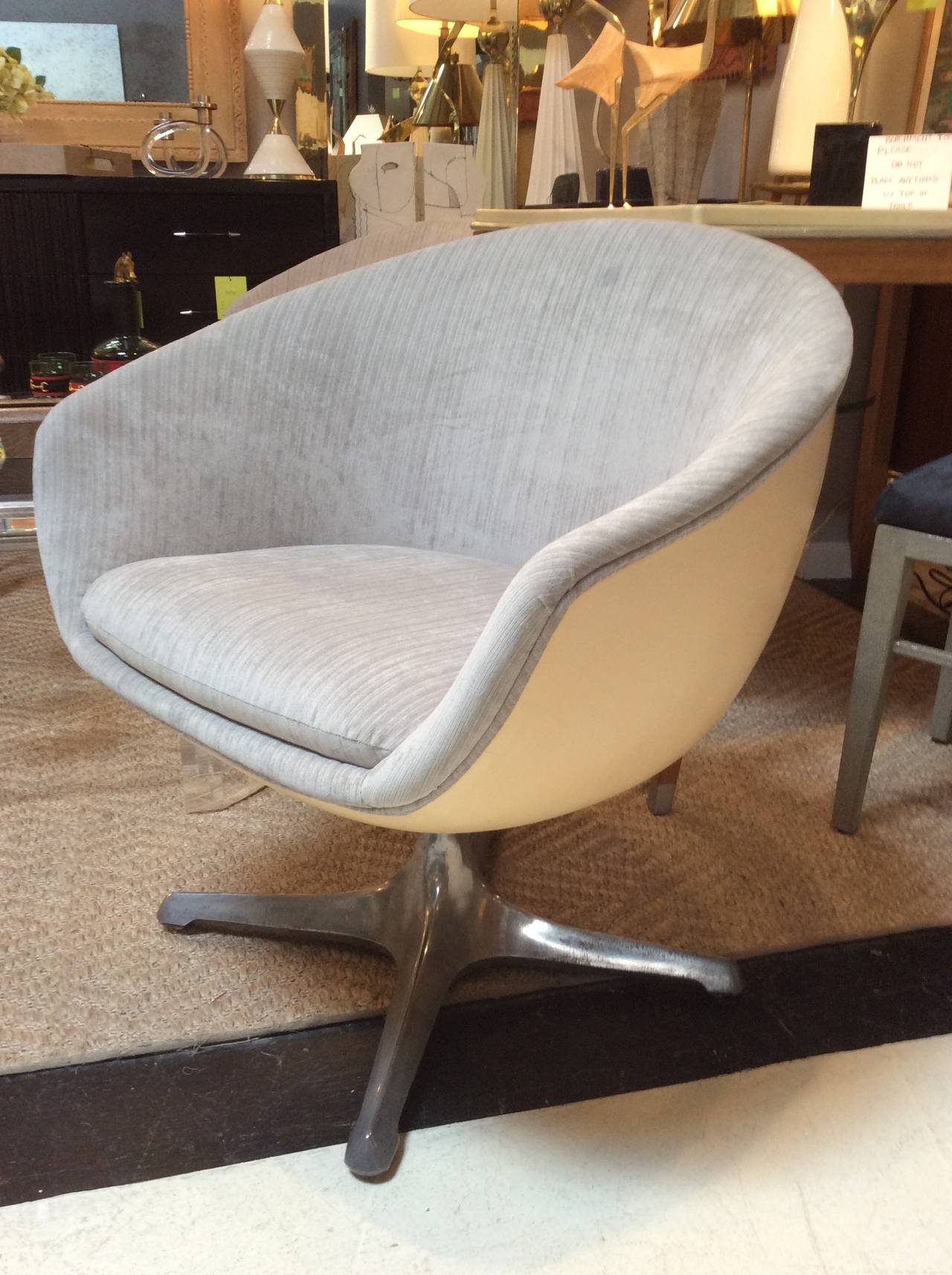 Extremely comfortable pair of 1960s pod chairs, newly upholstered in a dove gray striped velvet, with heavy aluminum propeller bases. Easy 360 degree swivel.