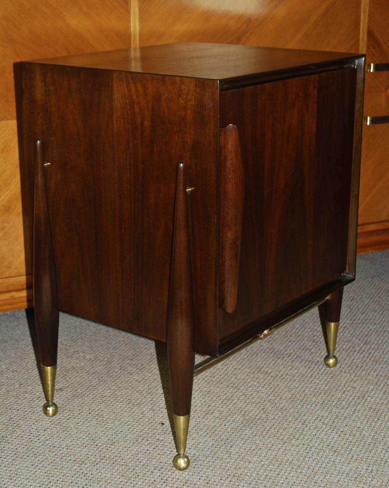 Newly refinished walnut nightstands with beautifully sculpted handle and legs.
Whimsical brass balls and casters on feet. Walnut grain nicely showcased.
Ample storage inside.

Please contact me to make sure items are available to view in gallery.