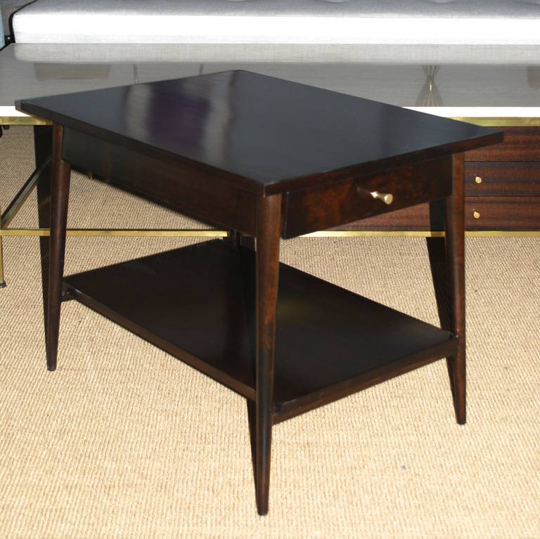 Pair of Paul McCobb side tables for planner with a drawer and a shelf.
Beautiful simple lines.
Newly refinished in deep walnut.