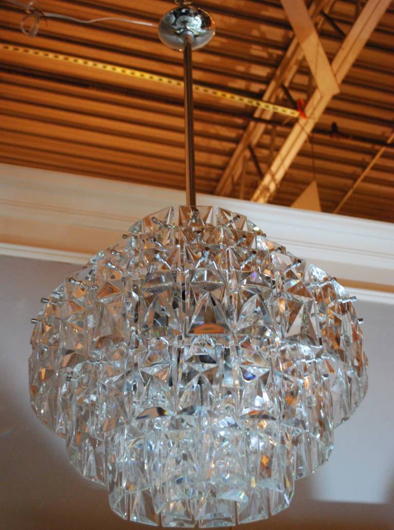 Large-scale chandeliers with 90 cut crystals and chrome details.
Purchased from an old Swiss hotel.
Newly wired and polished.