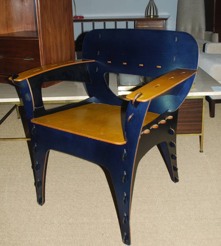 Two-tone, whimsical chair by David Kawecki, San Francisco. Original birch plywood design stained blue and yellow. Intricate design, sculptural lines.