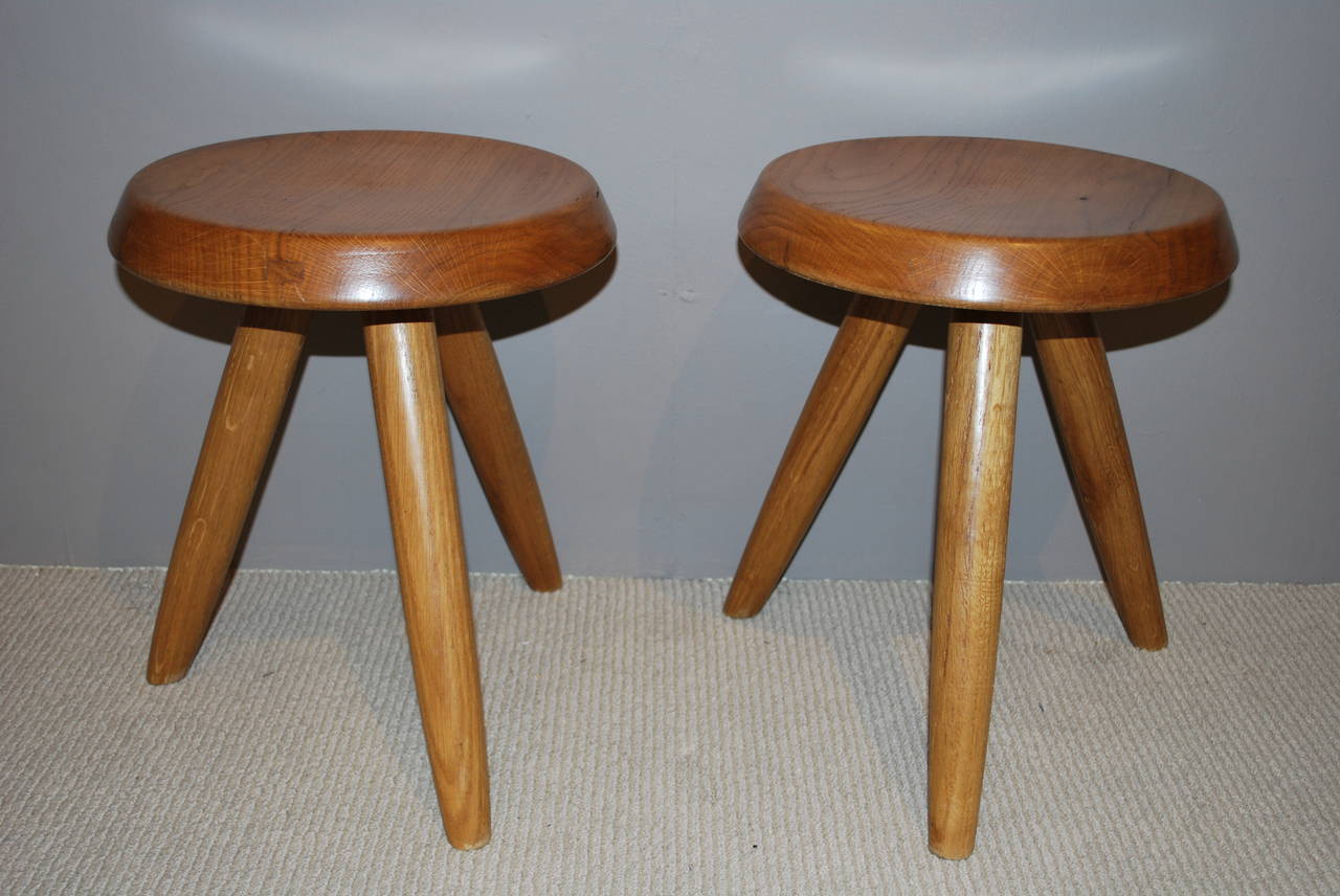 Pair of oak stools, designed by Charlotte Perriand in 1947 for Gallerie - Steph Simon, Paris. Stools are in wonderful original condition.
All characteristic marks of her work present.

Literature: Steph Simon: Retrospective1956-1974, Laffanour,