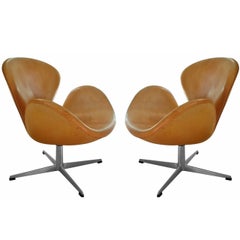 Rare Natural Leather Early Swan Chairs by Arne Jacobsen, circa 1963