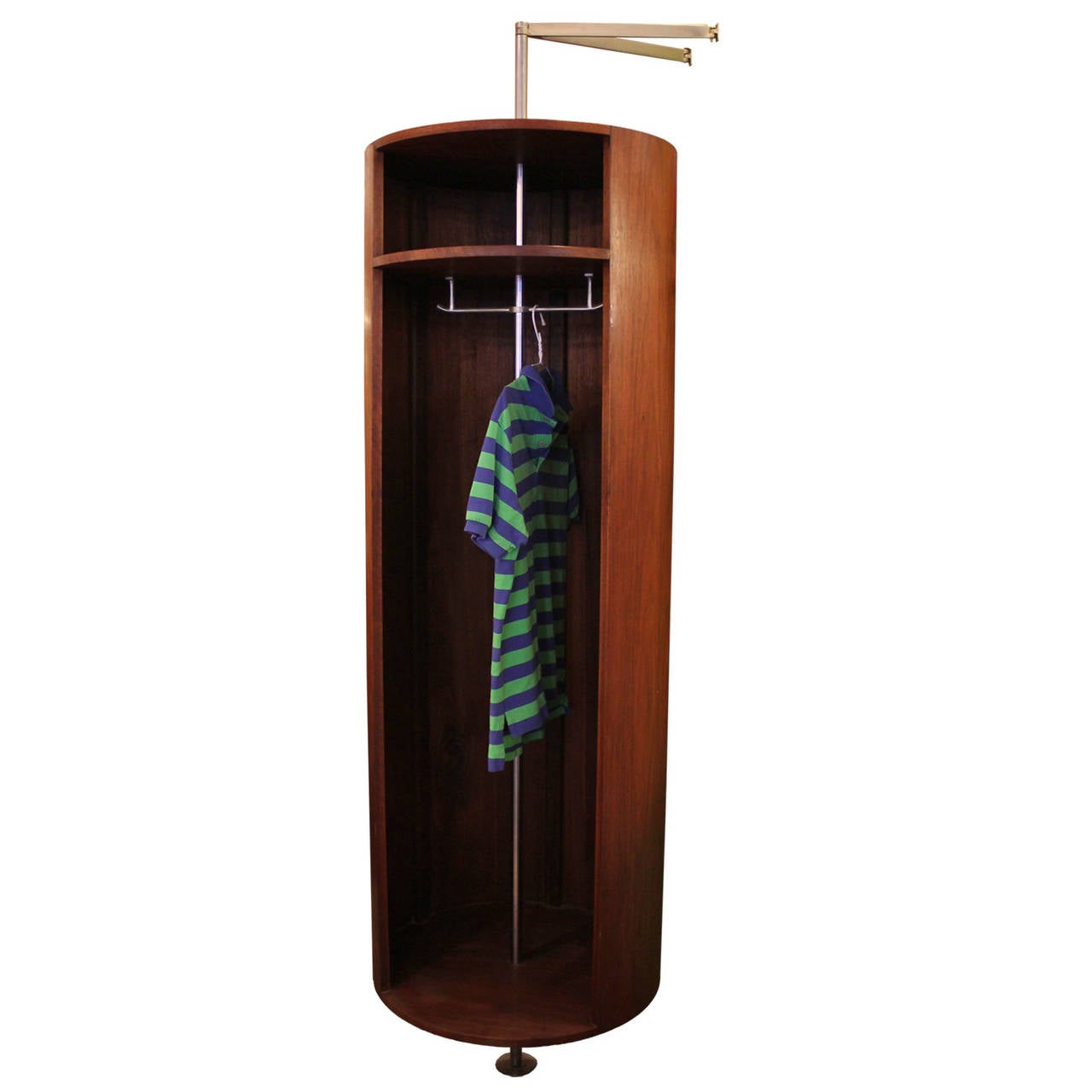 Fabulous cylindrical spinning walnut wardrobe closet. Mounts to wall and is supported by a pole. The inside reveals a single shelf and a hanging rod. A true statement piece.
