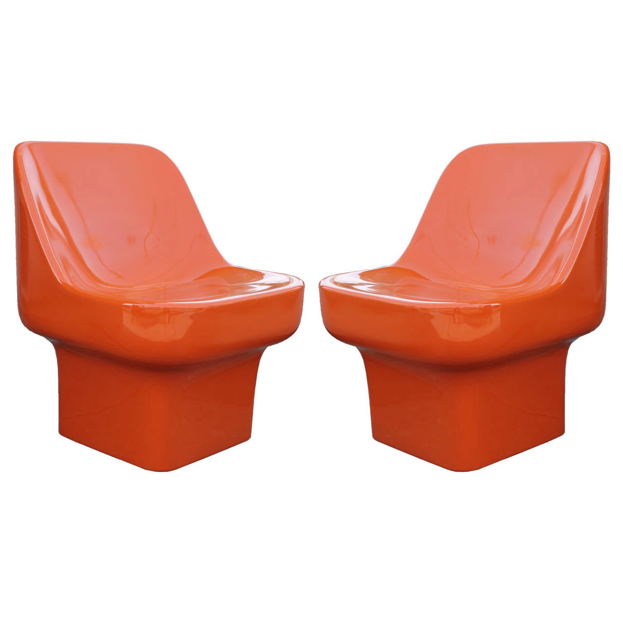 Sleek pair of lacquered fiberglass chairs in a Gloss orange by Douglas Deeds for  Architectural Fiberglass.  Restored in excellent condition.