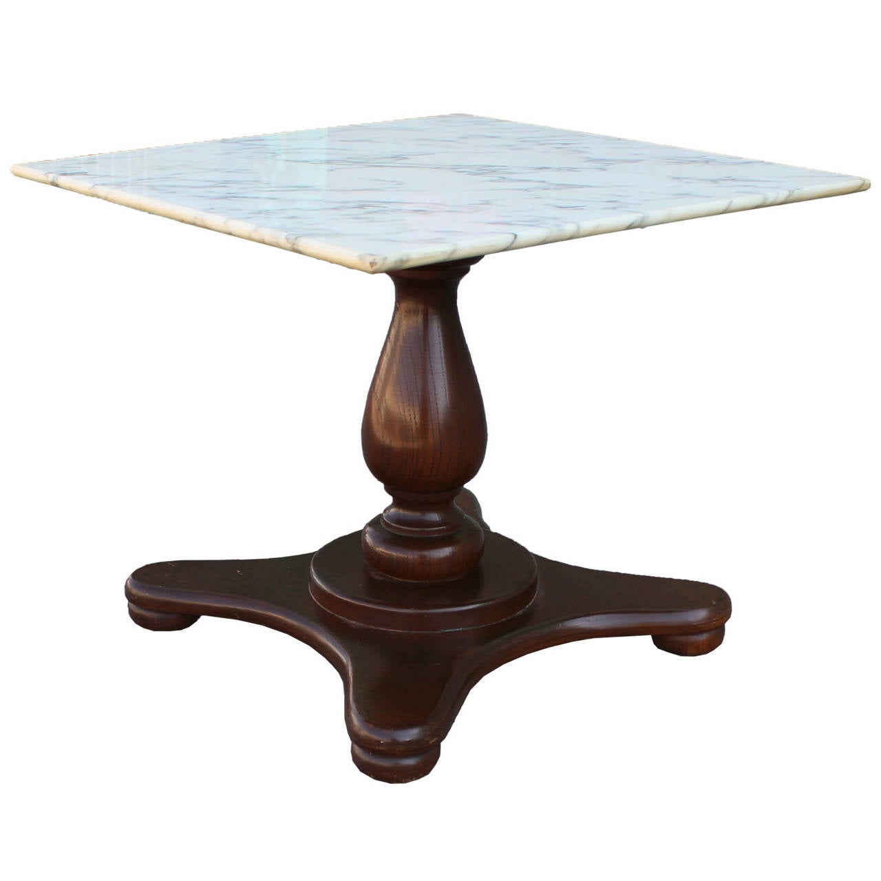 Beautiful white marble tops sit atop turned walnut bases. Perfect transitional pieces.