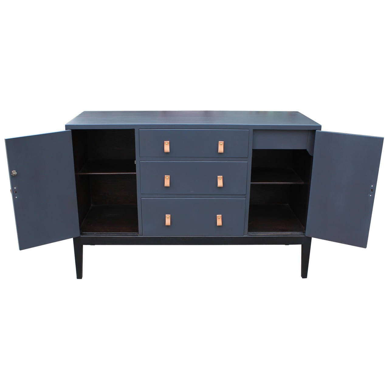Grey stained sideboard or buffet with custom cut leather handles. Buffet is made of mahogany. In excellent restored condition.