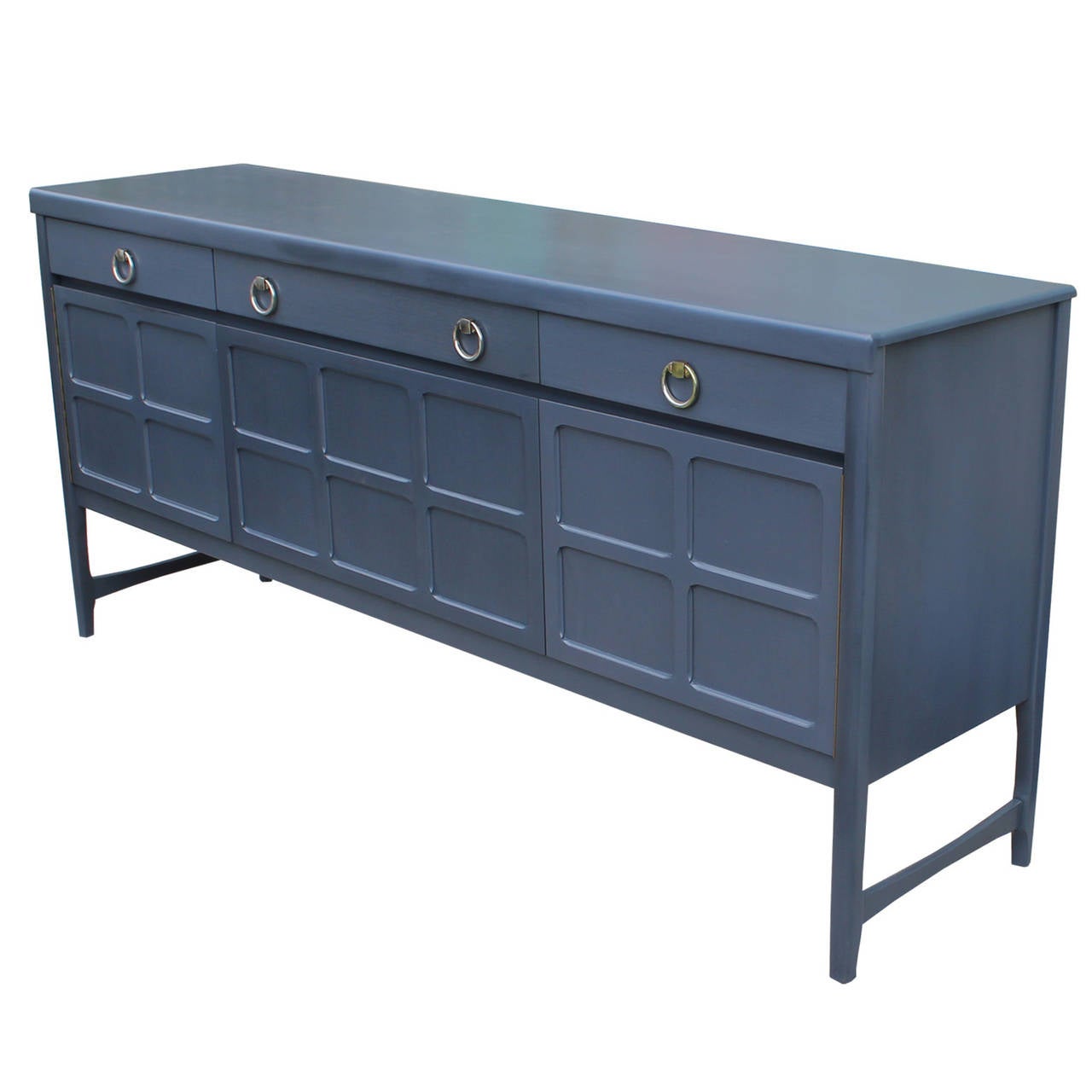 Grey sideboard with chrome handles. Sideboard / Credenza is made out of mahogany and teak. The piece has been stained a beautiful French Blue Grey color fully restored. Front middle cabinet door drops down.

Two available.