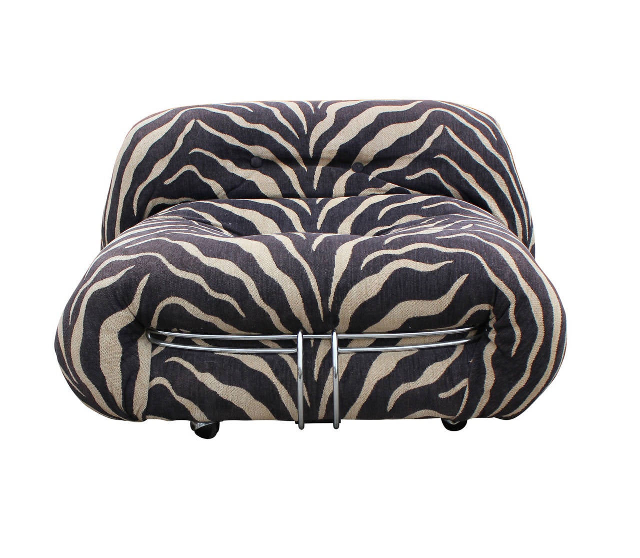 Beautiful sculptural, pleated lounge chairs designed by Tobia Scarpa for Casina.   Pleated and gathered fabric is contrasted with chrome accents. Chairs are low to the ground perfect for lounging. Currently upholstered in zebra print fabric;